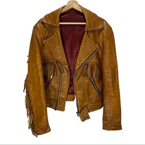 Vintage 70s Leather Tassel Motorcycle Jacket.  If is fabulous.